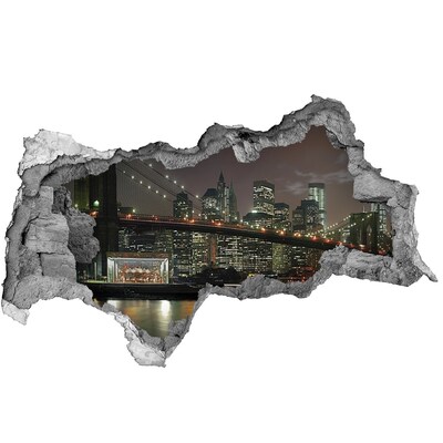 Mauerdurchbruch Aufkleber New York bei Nacht durch ein Loch in der Wand