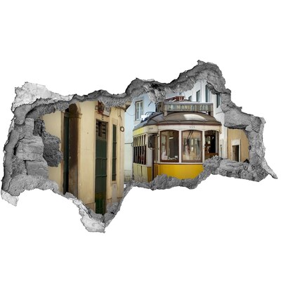 Mauerdurchbruch Aufkleber Eine gelbe Straßenbahn in einer engen Straße