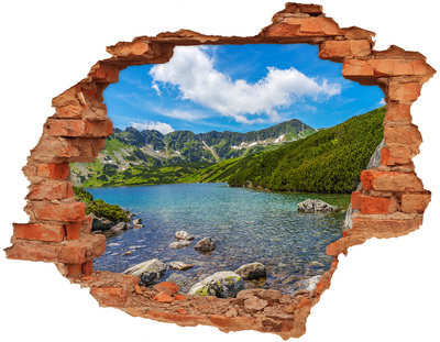 Wandtattoos Loch in der Wand Ein von Grün umgebener Bergsee