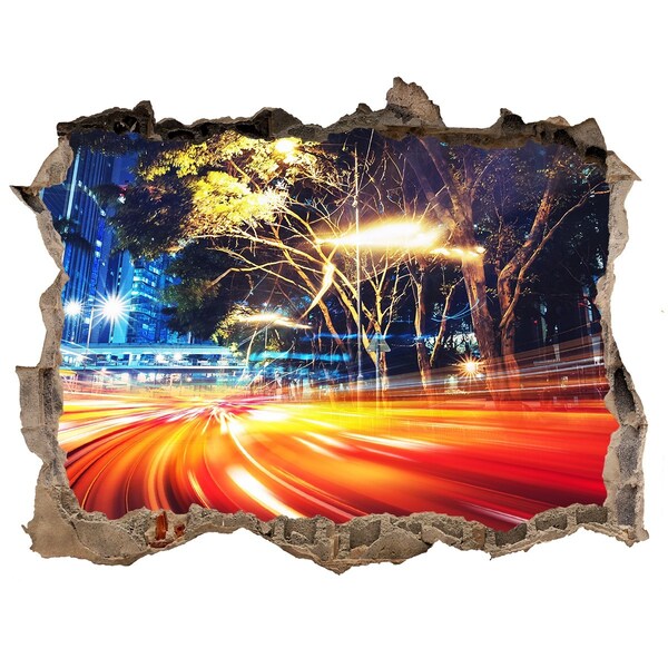Wandfolien Loch in der Wand Eine Stadt in Bewegung bei Nacht