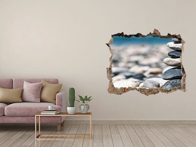 Wandfolien Loch in der Wand Steine ​​am Strand