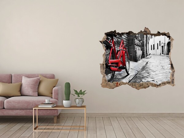 Wandfolien Loch in der Wand Ein rotes Fahrrad in einer charmanten Straße