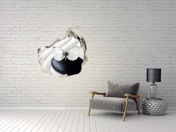 Wandtattoos Loch in der Wand Ein Schmetterling auf einem Stein in einer Zen-Umgebung