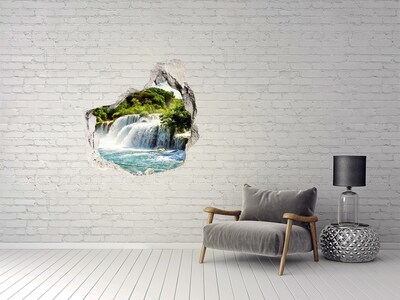 Wandaufkleber Loch 3D Ein Wasserfall inmitten des Grüns