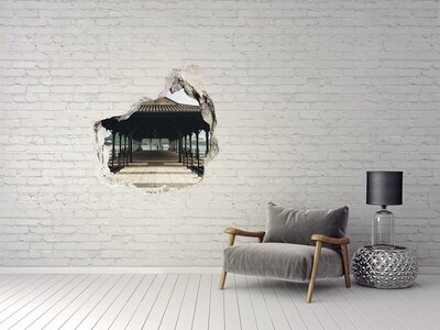 Wandfolien Loch in der Wand Blick auf den Pier über das Wasser