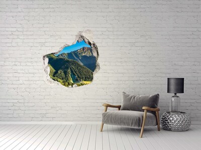 Wandaufkleber Loch 3D Berglandschaft mit einem Tal