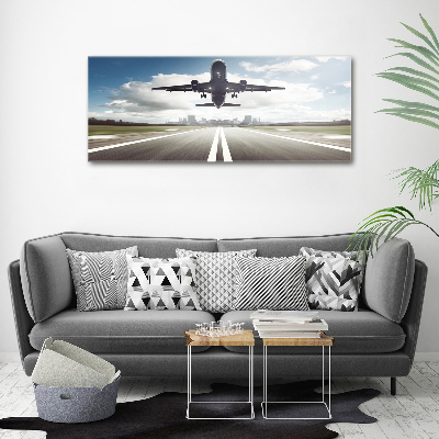 Foto auf Acryl Ein Flugzeug startet