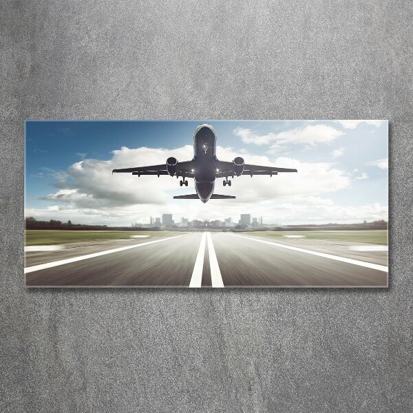 Foto auf Acryl Ein Flugzeug startet
