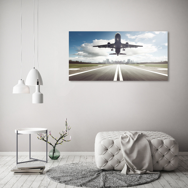 Foto auf Acryl Ein Flugzeug startet