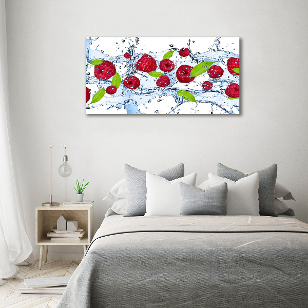 Bild auf Acrylglas Himbeeren und Wasser