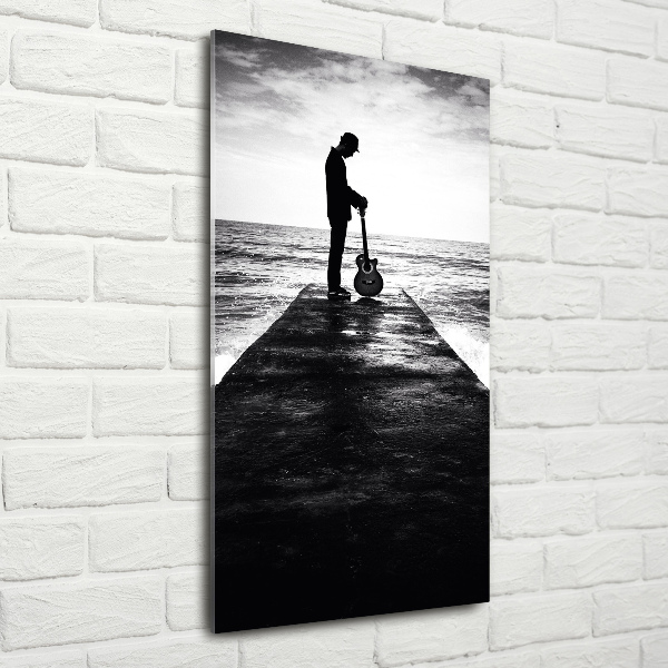 Plexiglasbilder vertikal Gitarrist auf dem Pier