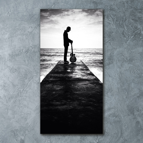 Plexiglasbilder vertikal Gitarrist auf dem Pier