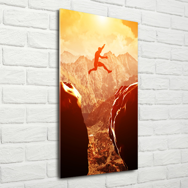 Bild auf Acrylglas vertikal Spring über den Abgrund