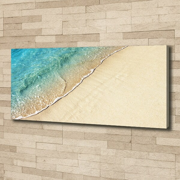 Wandbild Eine Welle am Strand