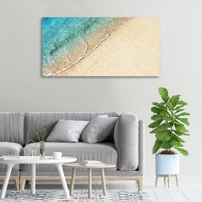Wandbild Eine Welle am Strand