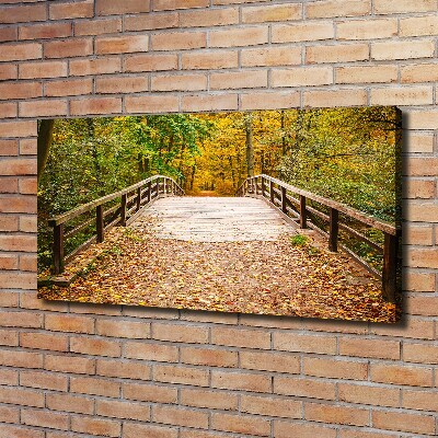 Bild auf leinwand Brücke im Herbstwald