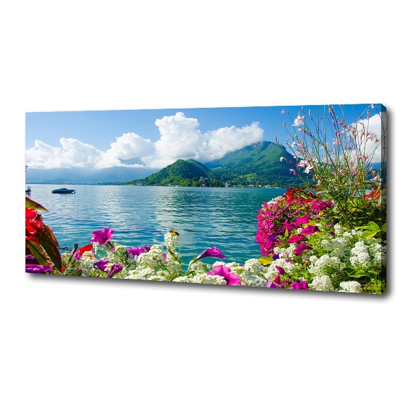 Bild auf leinwand Blumen am See