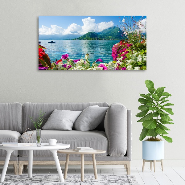 Bild auf leinwand Blumen am See