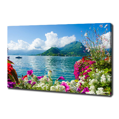 Bild auf leinwand Blumen am See