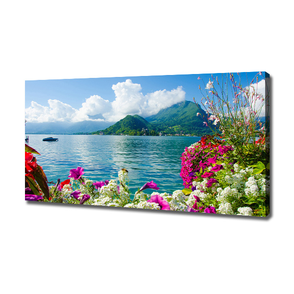 Bild auf leinwand Blumen am See