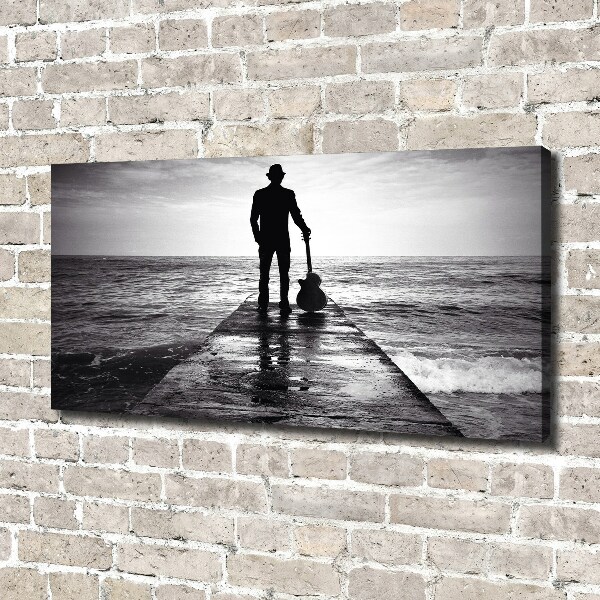 Fotobild Gitarrist auf dem Pier