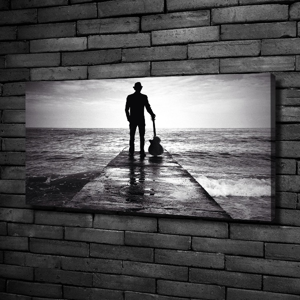 Fotobild Gitarrist auf dem Pier