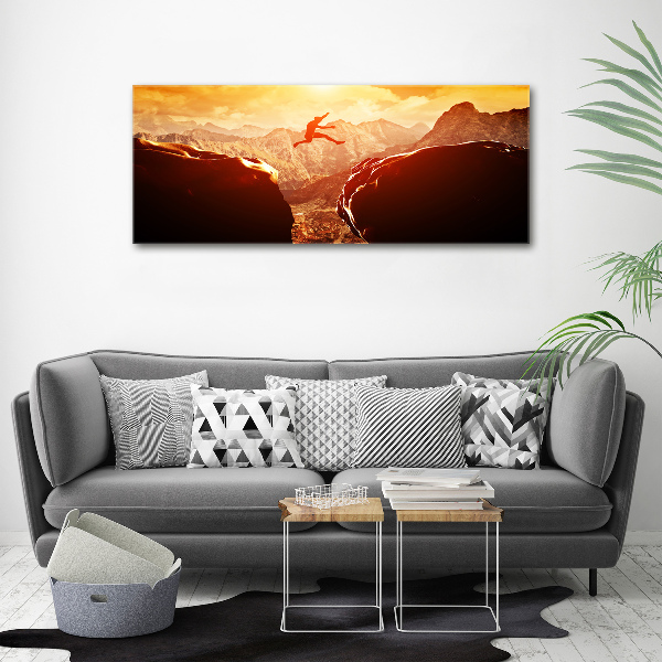 Wandbild Spring über den Abgrund