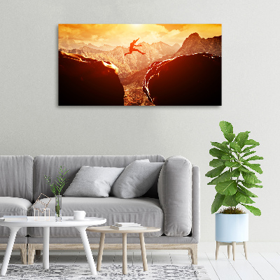 Wandbild Spring über den Abgrund