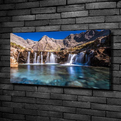 Bild auf leinwand Wasserfall in den Bergen