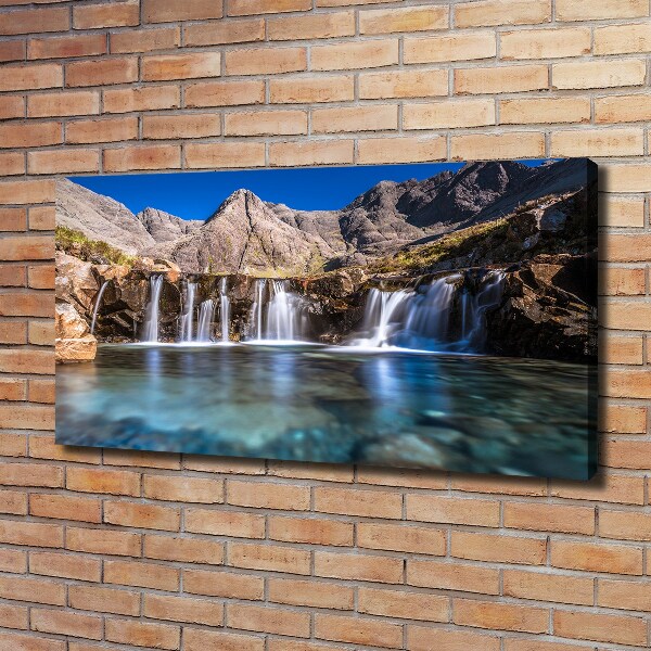 Bild auf leinwand Wasserfall in den Bergen
