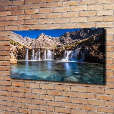 Bild auf leinwand Wasserfall in den Bergen
