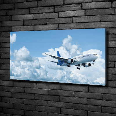 Wandbild Ein Flugzeug am Himmel