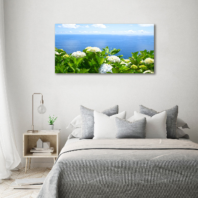 Bild auf leinwand Blumen am Meer