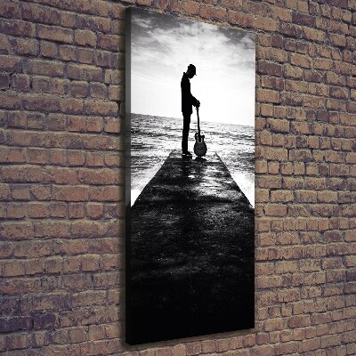 Foto leinwand vertikales Gitarrist auf dem Pier