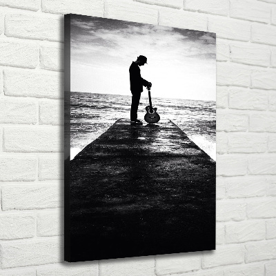 Foto leinwand vertikales Gitarrist auf dem Pier
