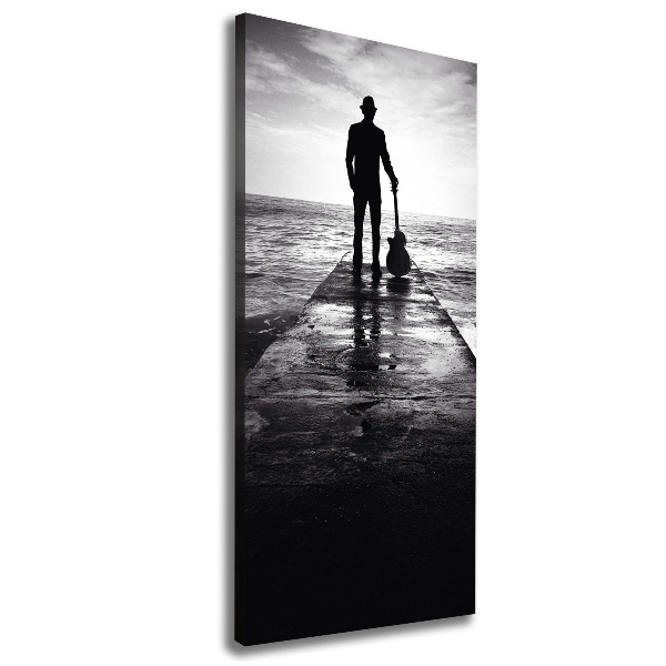 Foto auf leinwand vertikales Gitarrist auf dem Pier