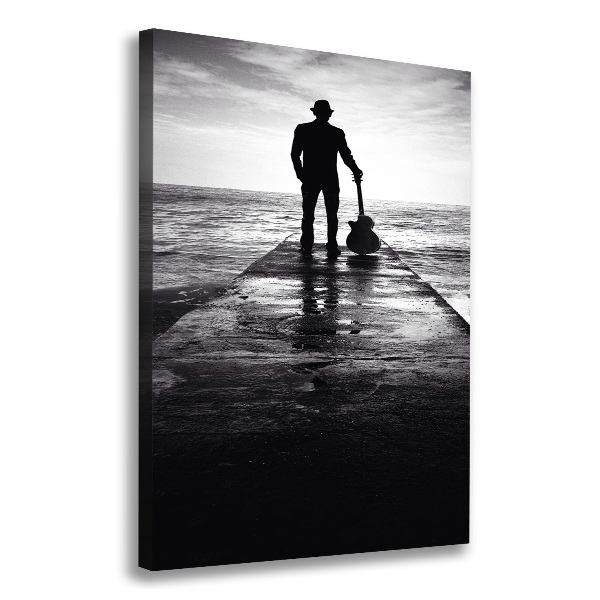 Foto auf leinwand vertikales Gitarrist auf dem Pier