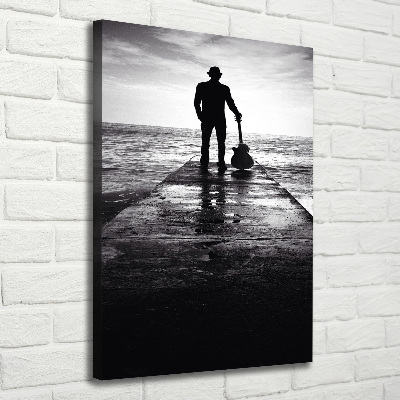 Foto auf leinwand vertikales Gitarrist auf dem Pier