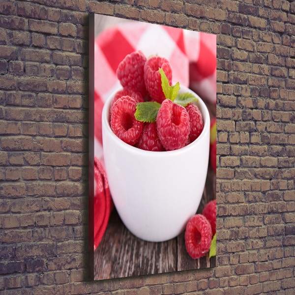 Wandbild vertikales Himbeeren in einer Tasse