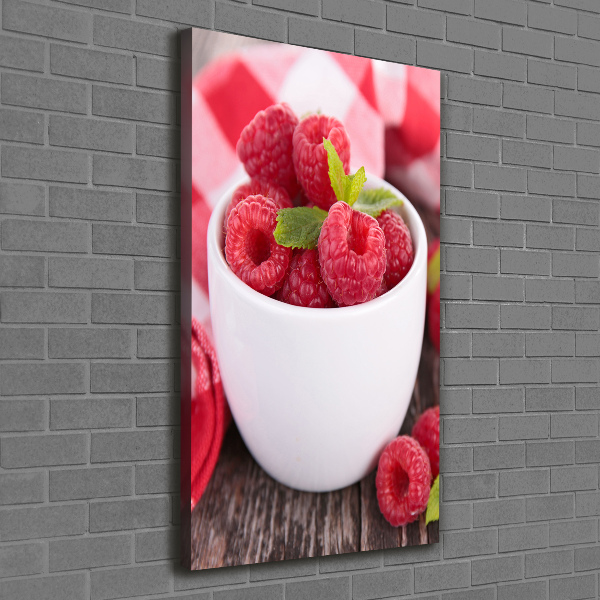 Wandbild vertikales Himbeeren in einer Tasse