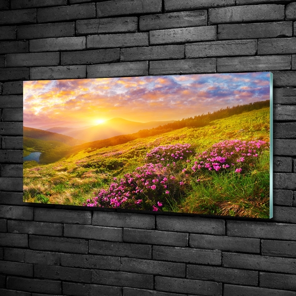 Foto glasbild Sonnenuntergang in den Bergen