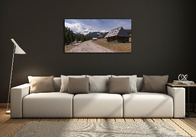 Foto glasbild Ein Ferienhaus in den Bergen