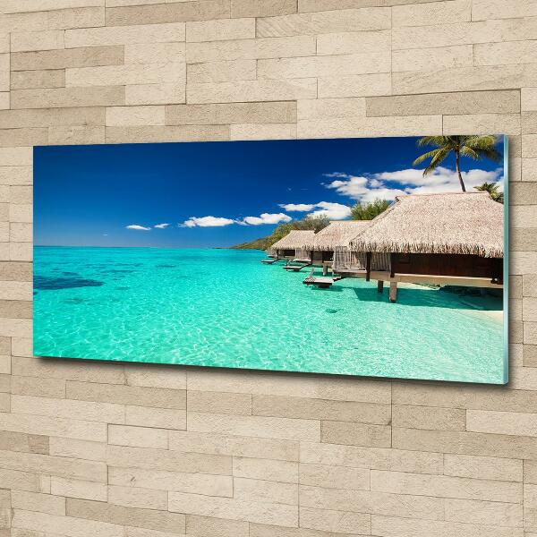 Glasbild Bungalows über dem Wasser