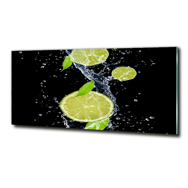 Glasbild Limetten und Wasser