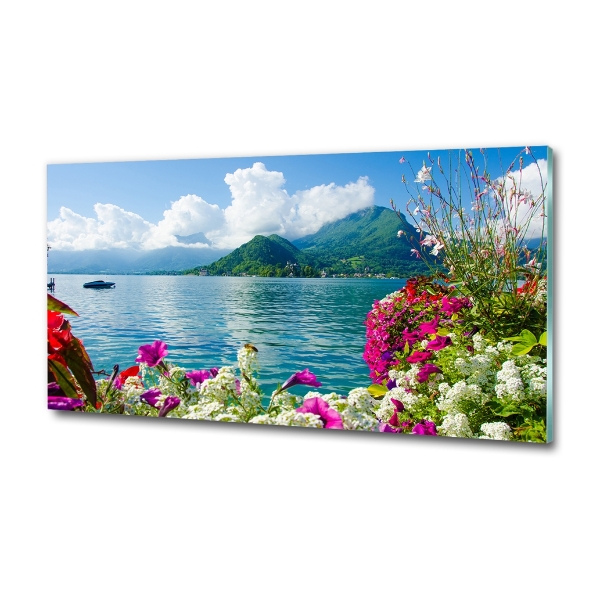 Bild auf glas Blumen am See