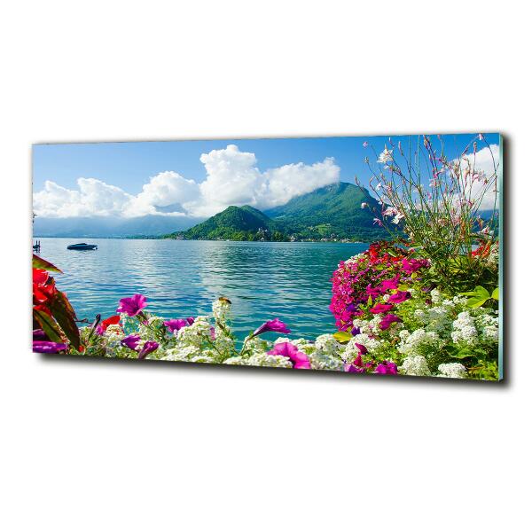 Bild auf glas Blumen am See