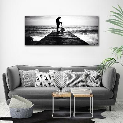 Glasbild Gitarrist auf dem Pier