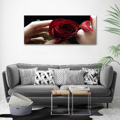 Glasbild Frau mit einer Rose