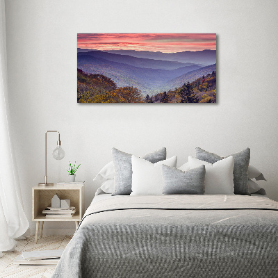 Foto glasbild Sonnenuntergang in den Bergen