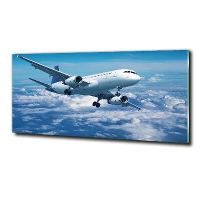 Bild auf glas Ein Flugzeug in den Wolken